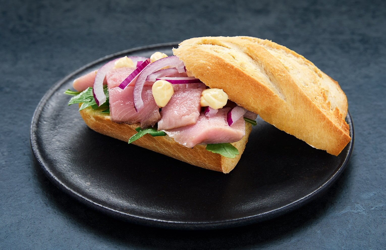 Matjes herring roll with mustard mayonnaise