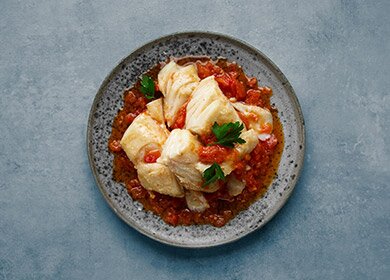 Norwegian salted cod with tomato sauce