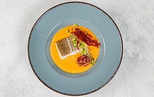 Norwegian skrei in a creamy pickled sauce