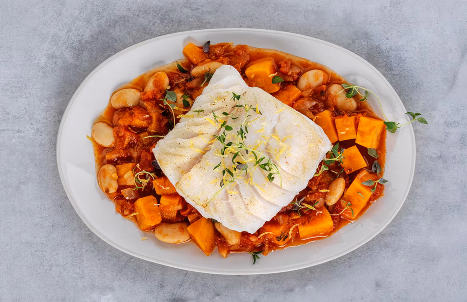 Skrei sautéed with beans, sweet potato and thyme